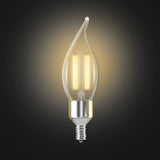 Clear LED light bulb on a dark background