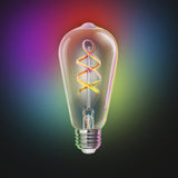Decorative light bulb with colorful spiral filament on a gradient background